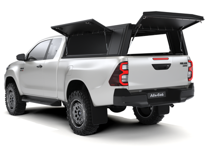 Hardtop Alu-Cab "Guard" pour Toyota Hilux Revo 2016+ Extra Cab, robuste et en aluminium, vue latérale du véhicule.