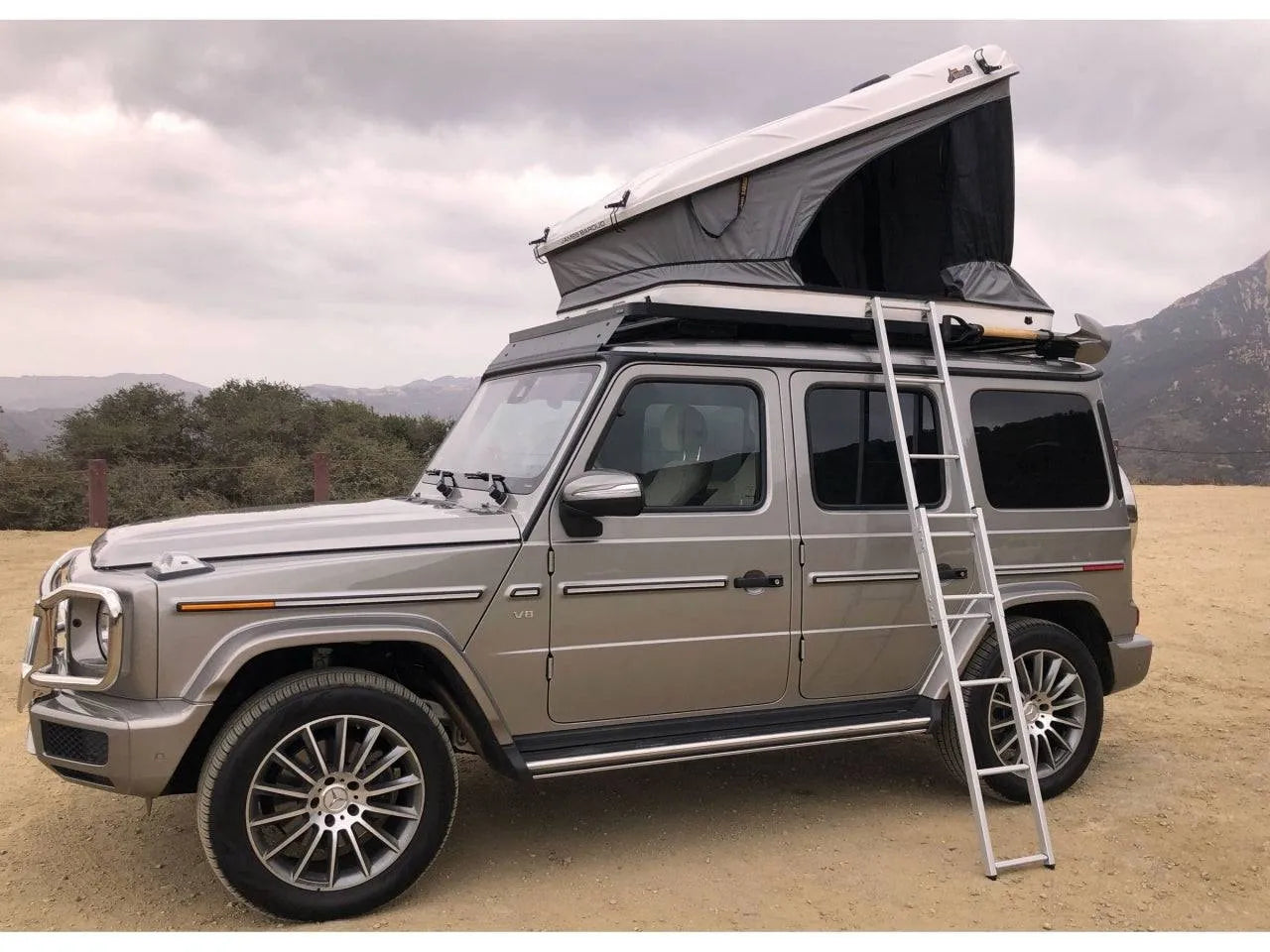 Tente de toit Space EVO S/M/XL - James Baroud - ouverture portefeuille sur Xperts4x4 Accessoires 4x4 Off-Road
