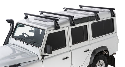 Kit 4 barres de toit noire Heavy Duty 1500mm avec pieds RL210 Land Rover Defender 110 1993-2020 - RHINO-RACK sur Xperts4x4 Accessoires 4x4 Off-Road