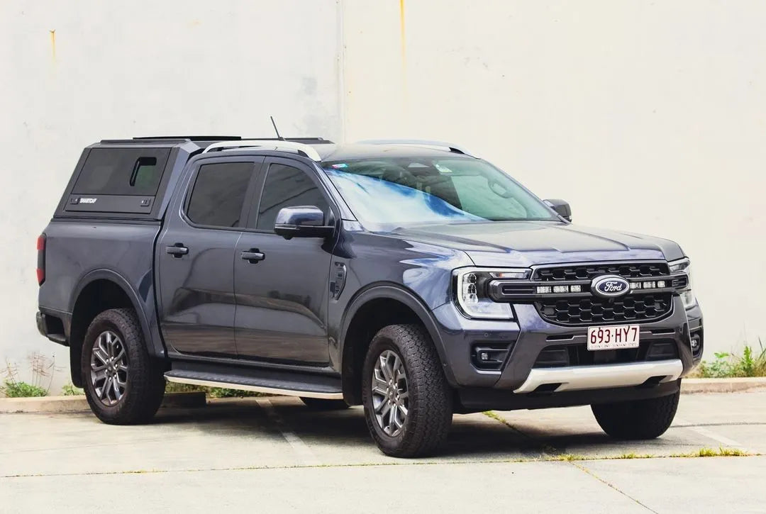 Hardtop RSI EVOs SPORT pour Ford Ranger/Raptor 2023+ Next Gen, en aluminium noir, fixé sur la caisse du véhicule.