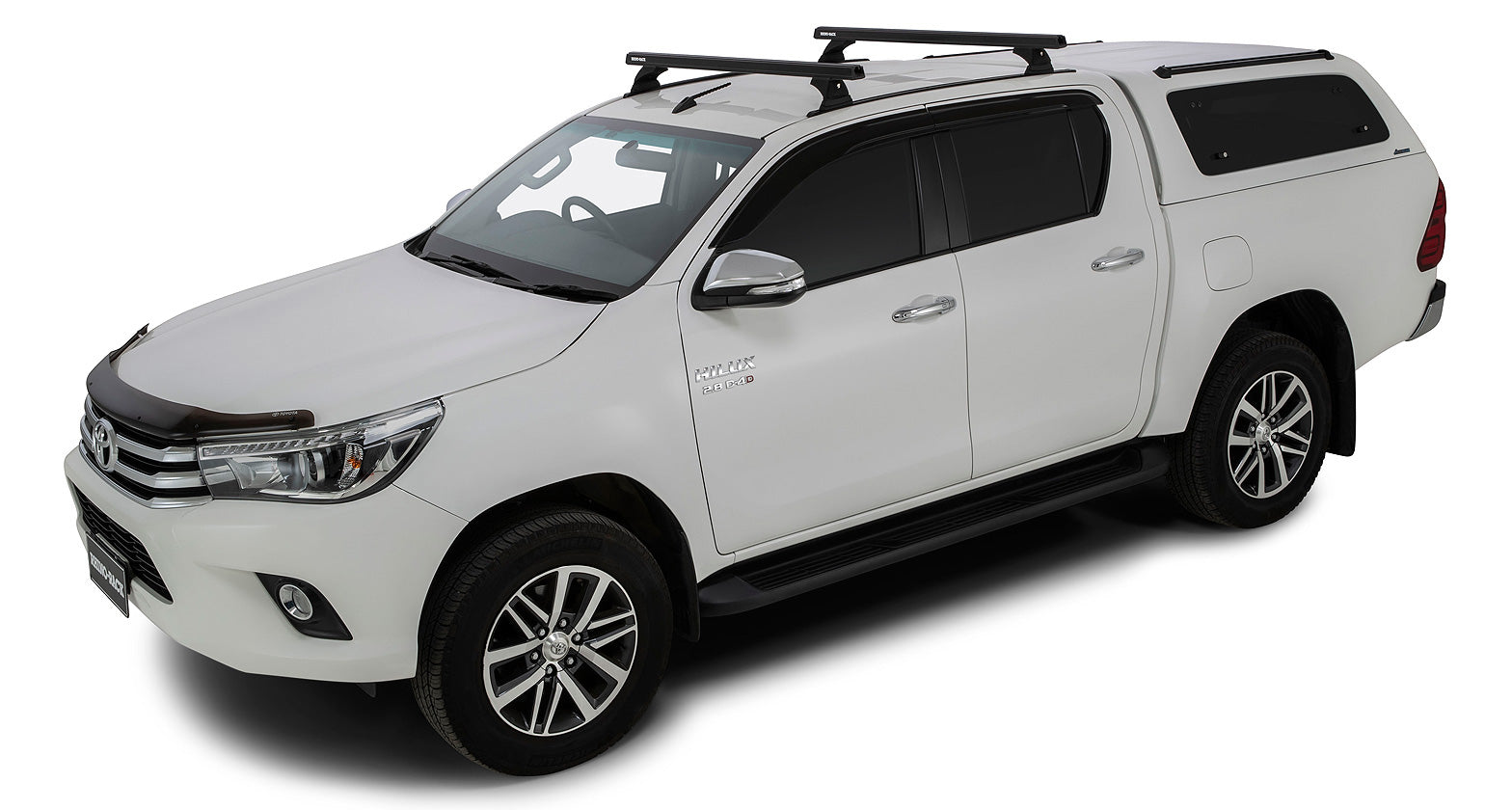 Kit 2 barres de toit noire 1250mm Heavy Duty RCH Trackmount Toyota Hilux Revo 2015+ - RHINO-RACK sur Xperts4x4 Accessoires 4x4 Off-Road